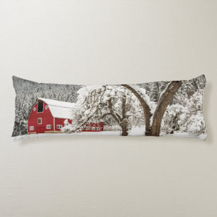 Fresh snow on red barn body pillow