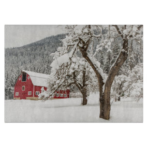 Fresh snow on red barn cutting board