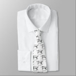 Frida Kahlo "FK" Monogram Signature Pattern Tie<br><div class="desc">This tie features a sophisticated repeating pattern based on Frida Kahlo's iconic initials and signature. The stylized "FK" monogram is prominently displayed in bold black, with her authentic full signature elegantly placed beneath each initial. The minimalist design stands out beautifully against a clean white background, creating a chic and artistic...</div>