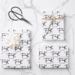 Frida Kahlo "FK" Monogram Signature Pattern Wrapping Paper Sheet<br><div class="desc">This gift wrap features a sophisticated repeating pattern based on Frida Kahlo's iconic initials and signature. The stylized "FK" monogram is prominently displayed in bold black, with her authentic full signature elegantly placed beneath each initial. The minimalist design stands out beautifully against a clean white background, creating a chic and...</div>