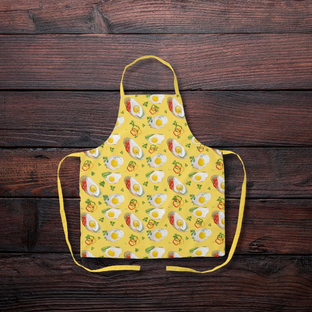 Fried eggs with bell peppers yellow apron (Creator Uploaded)