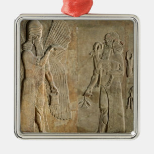 Frieze depicting a winged spirit metal ornament