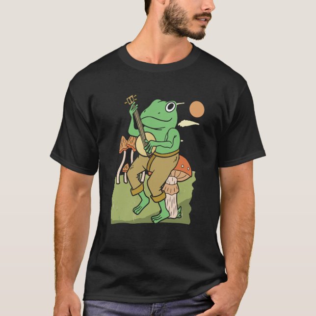 Frog Playing Banjo on Mushroom cute Frog T-Shirt (Front)