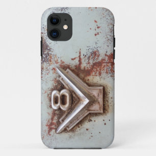 From classic car: Rusty old v8 emblem in chrome iPhone 11 Case