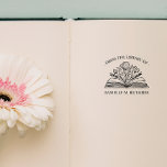 FROM THE LIBRARY OF YOUR NAME OPENED BOOK FLOWERS RUBBER STAMP<br><div class="desc">Elegant bookplate STAMP with your personalized name, perfect for adding a personal touch to your cherished book collection. The bookplate showcases a gracefully curved "From the Library of" inscription at the top, a stunning illustration of an opened book with flower and leaves in the centre. Replace the name below the...</div>