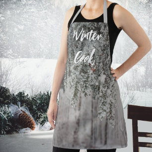 Frosted branches and a snow-covered forest apron