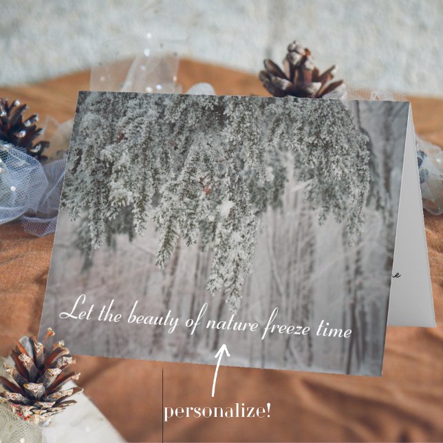 Frosted branches and a snow-covered forest holiday card (Creator Uploaded)