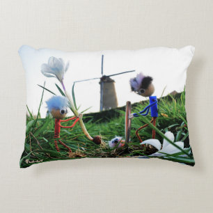 Fubbies in a mill plant a crown ball. accent pillow