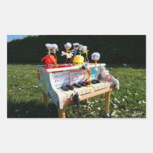 Fubbies on the piano making and dancing music. sticker