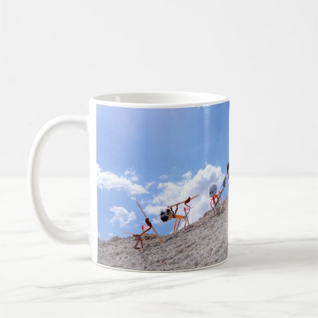 Fubby puppetets on the ski slopes, with a fall. coffee mug (Left)