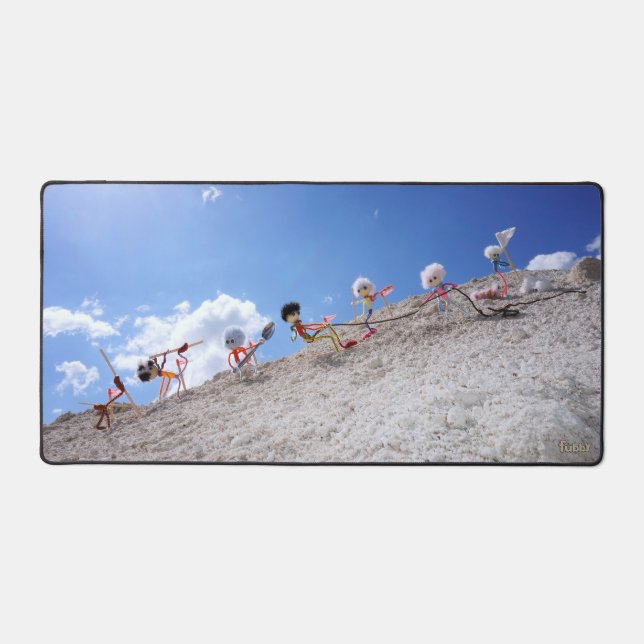 Fubby puppetets on the ski slopes with a fall desk mat (Front)