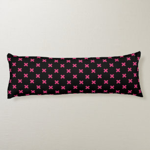 Fuchsia cross stitches on black body pillow