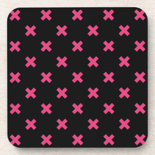 Fuchsia cross stitches on black coaster