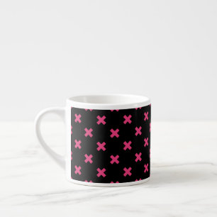 Fuchsia cross stitches on black espresso cup