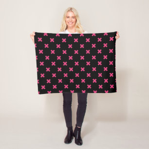 Fuchsia cross stitches on black fleece blanket