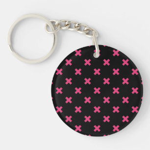 Fuchsia cross stitches on black keychain