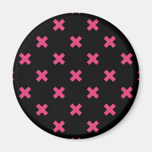 Fuchsia cross stitches on black magnet