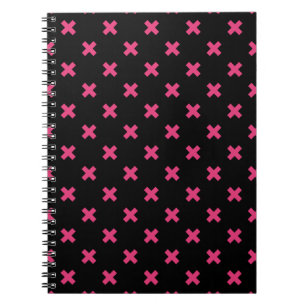 Fuchsia cross stitches on black notebook