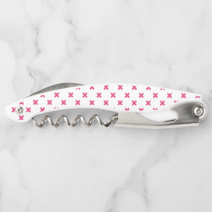 Fuchsia cross stitches on white corkscrew