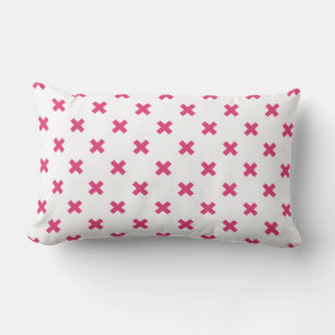 Fuchsia cross stitches on white lumbar pillow