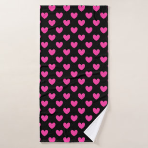 Fuchsia pink polka hearts on black bath towel
