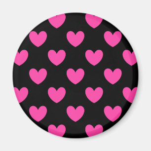 Fuchsia pink polka hearts on black magnet