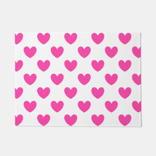 Fuchsia pink polka hearts on white doormat