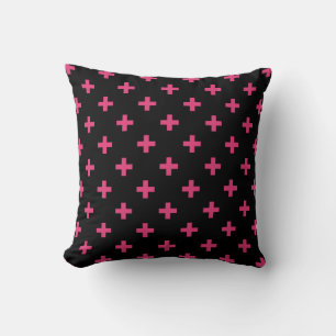Fuchsia polka crosses on black throw pillow