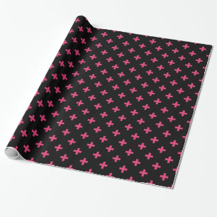 Fuchsia polka crosses on black wrapping paper