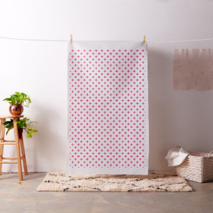 Fuchsia polka crosses on white fabric