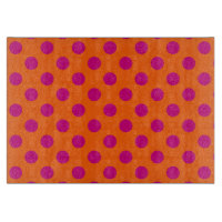 Fuchsia polka dots on orange