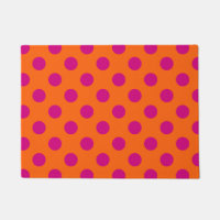 Fuchsia polka dots on orange