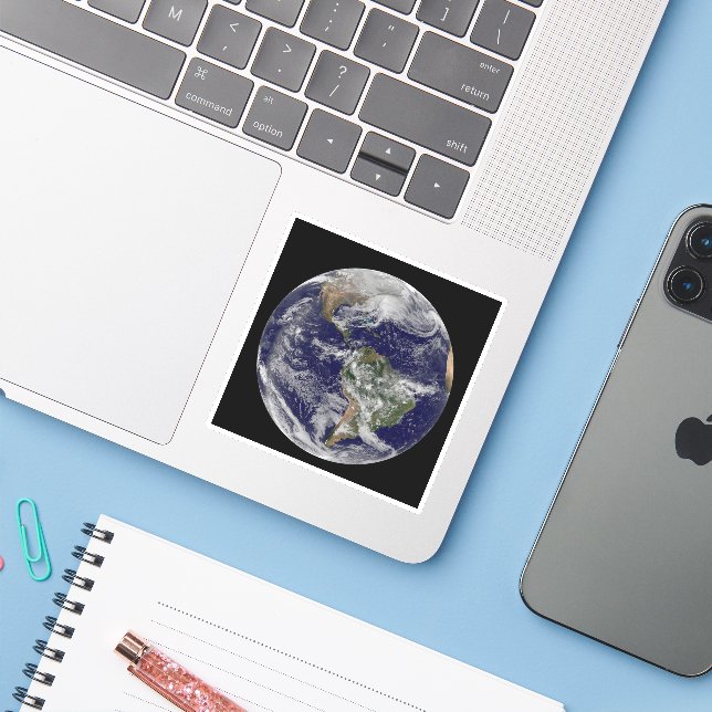 Full Earth Showing A Powerful Winter Storm. (Laptop w/ iPhone)