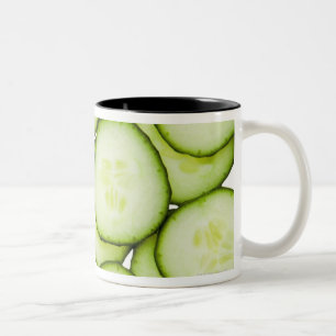 Full frame of sliced cucumber, on white Two-Tone coffee mug