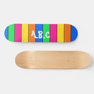 FUN BRIGHTLY COLORED STRIPY PATTERN WITH INTIALS SKATEBOARD