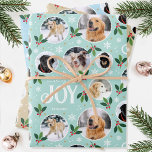 Fun Christmas Joy Snowflake Photo Collage 3 Set Wrapping Paper Sheet<br><div class="desc">'Wishing you joy' fun and stylish wrapping paper set! Three editable templates, each personalized with six photos of your family, friends or pets. You can also include a different name on each sheet. A festive pattern with snowball framed photographs, festive leaves, berries, snow, snowflakes and stars. Custom gift wrap is...</div>