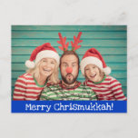 Fun Modern Merry Christmukkah Photo Blue and White Holiday Postcard<br><div class="desc">Celebrate the holiday season with this fun and merry postcard featuring your favourite family photo (or take a fun one just for Christmukkahh this year) on a blue background with white text. All the text on this card can be personalized, including the Merry Chrismukkah on the front and the Happy...</div>