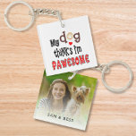 Fun My Dog Thinks I’m Pawesome Photo Name Keychain<br><div class="desc">Fun My Dog Thinks I’m Pawesome Artsy Text Name. Humourous play on words dog humour with the pun My Dog Thinks I’m Pawesome, for Awesome, with quirky lettering with cute paw print motifs. Great gift for your pooch loving friends - and you can personalise with their names and add a...</div>