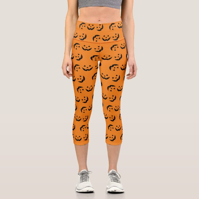 Fun orange black jack o lantern pattern Halloween Capri Leggings (Front)
