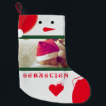 Fun Snowman Your Photo Name Cute Baby Toddler Red Small Christmas Stocking<br><div class="desc">Adorable cute design featuring a Christmas Snowman wearing a red Santa's hat, two custom photos, your child's name all on a great Christmas stocking to hang on the mantle on Christmas. The background features a snowy white knitted background, with white knitted hearts covered in snow.</div>