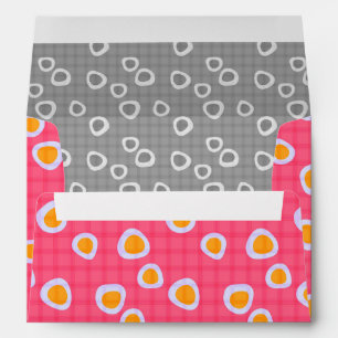 Fun spots on a coral pink checkered background envelope