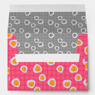 Fun spots on a coral pink chequered background envelope