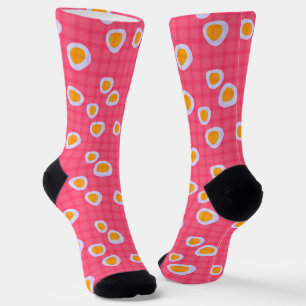 Fun spots on a coral pink chequered background socks