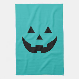 Fun teal jack o lantern pumpkin face Halloween Kitchen Towel
