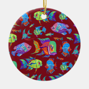 Fun tropical fishes on dark red ceramic ornament