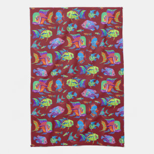 Fun tropical fishes on dark red kitchen towel