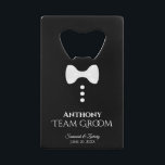 Fun White Tie Tuxedo Team Groom Wedding Credit Card Bottle Opener<br><div class="desc">This fun bottle opener is designed as a gift for Groomsmen, Family, or your Best Man. Features a fun design with a white tie and three buttons on a black background resembling a tuxedo. The text reads "Team Groom" with a place for his name, the wedding couple's names and wedding...</div>