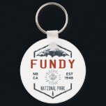 Fundy National Park Canada Vintage Distressed Keychain<br><div class="desc">Fundy National Park Distressed Badge with unique park themed maple leaf design. The Park showcases a rugged coastline which rises up to the Canadian Highlands,  the highest tides in the world and more than 25 waterfalls.</div>
