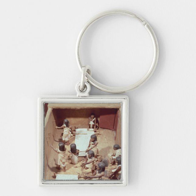 Funerary model of a textile workshop keychain (Front)