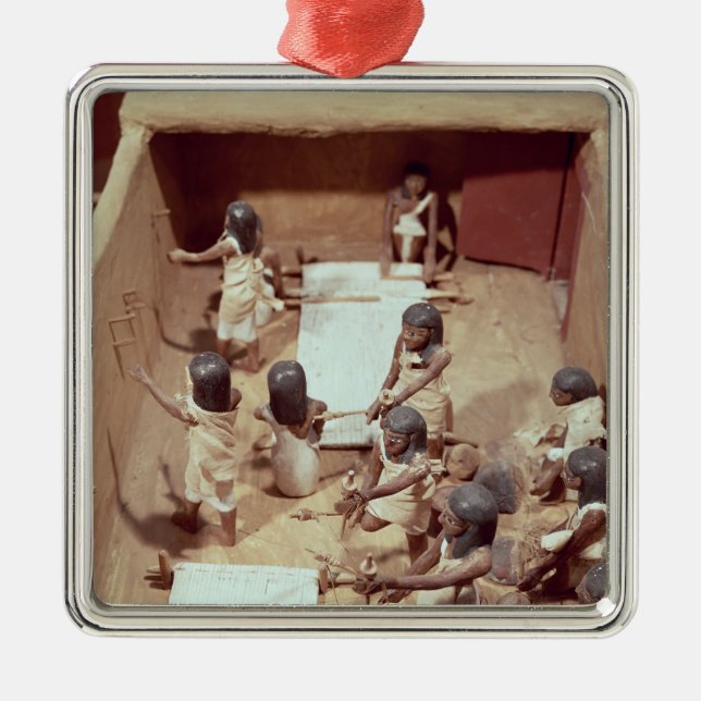 Funerary model of a textile workshop metal ornament (Front)